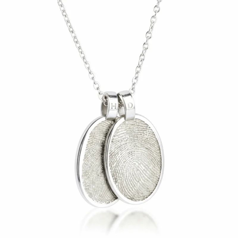 Personalised jewellery fingerprint pendant necklace. Thumbprint jewellery. Keepsake or memorial jewellery.