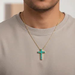 ashes memorial pendant in a cross shape in yellow gold worn by a male