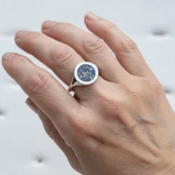 Ashes memorial ring in sterling silver worn on hand.