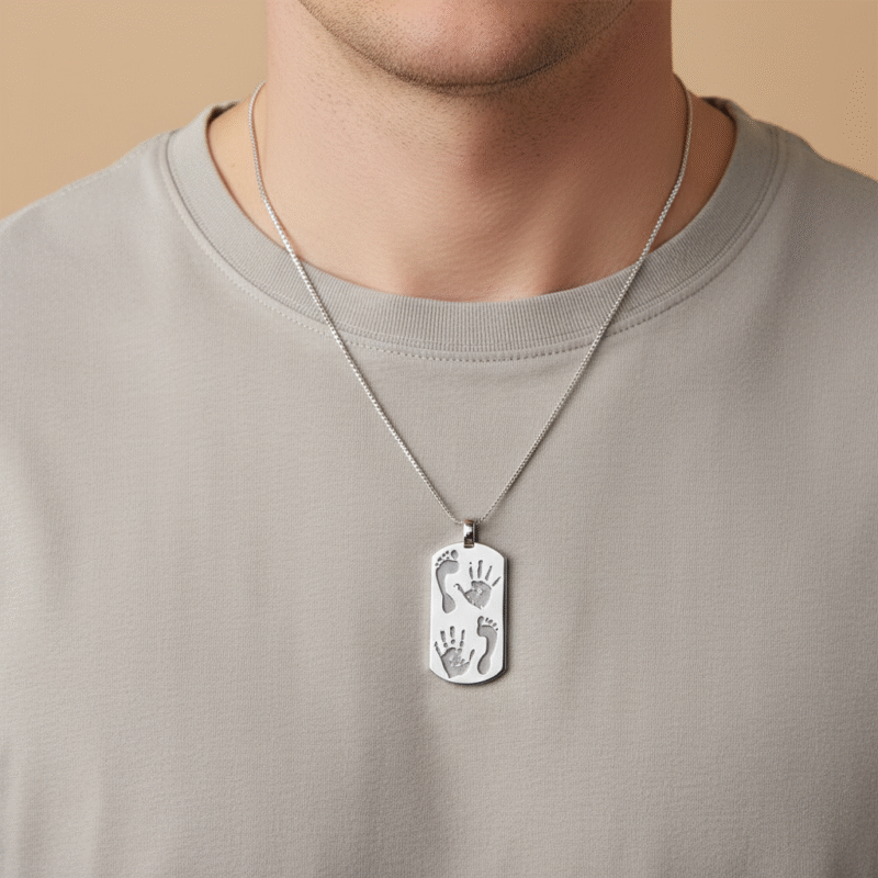 Hand and Footprint Dogtag necklace worn by a male in sterling silver