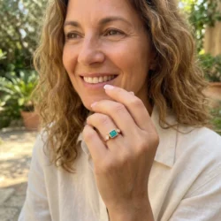 Female model wearing ashes ring with diamonds and